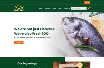 fish 2 go's homepage with a fresh fish on the right and a slice of lemon